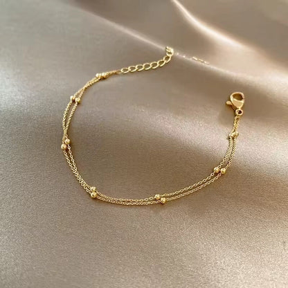 Fashion double-layer small round pearl golden bracelet
